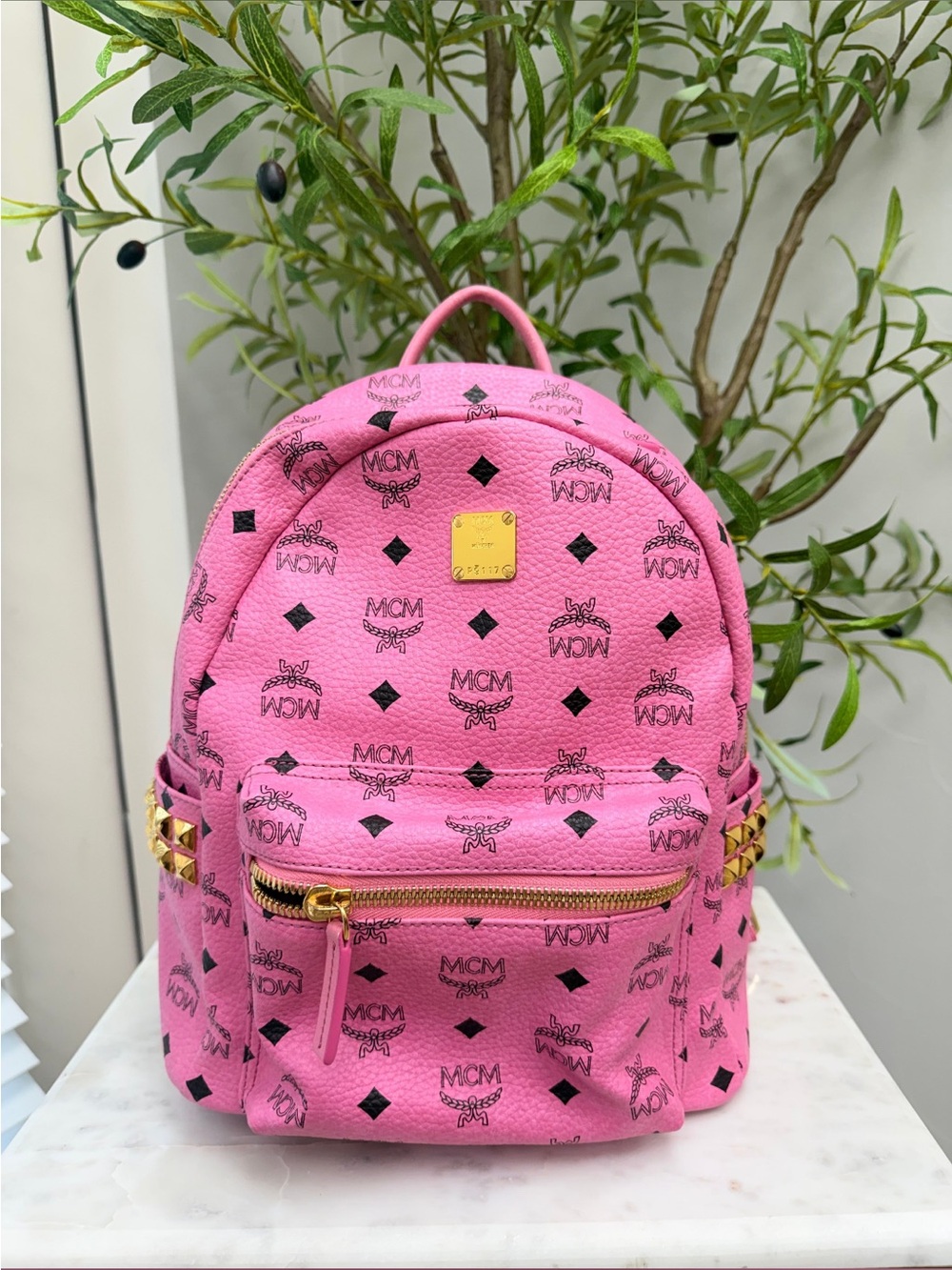 Authentic MCM Pink Logo Monogram Mini Backpack with Gold Hardware COA included.